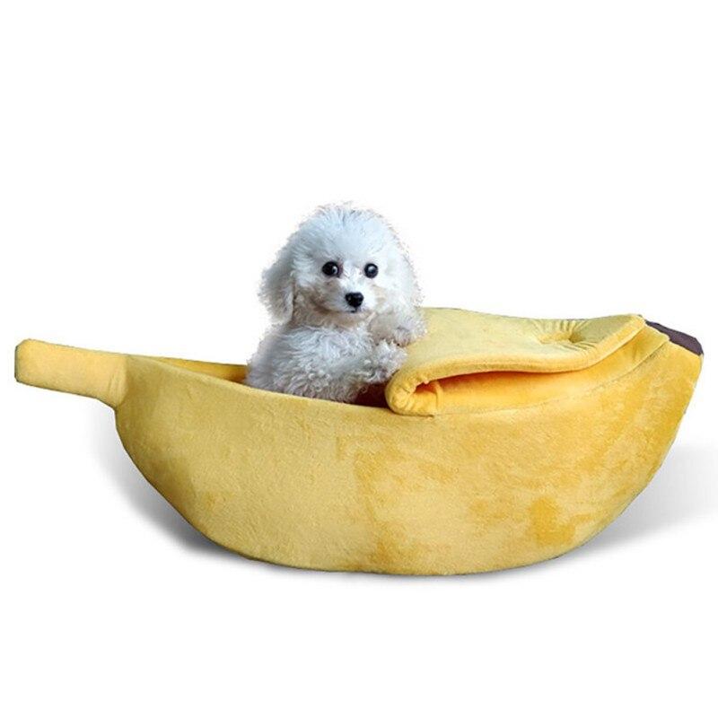 Cozy banana-shaped dog bed designed for pets, featuring a soft fiber material and a unique design for comfort.