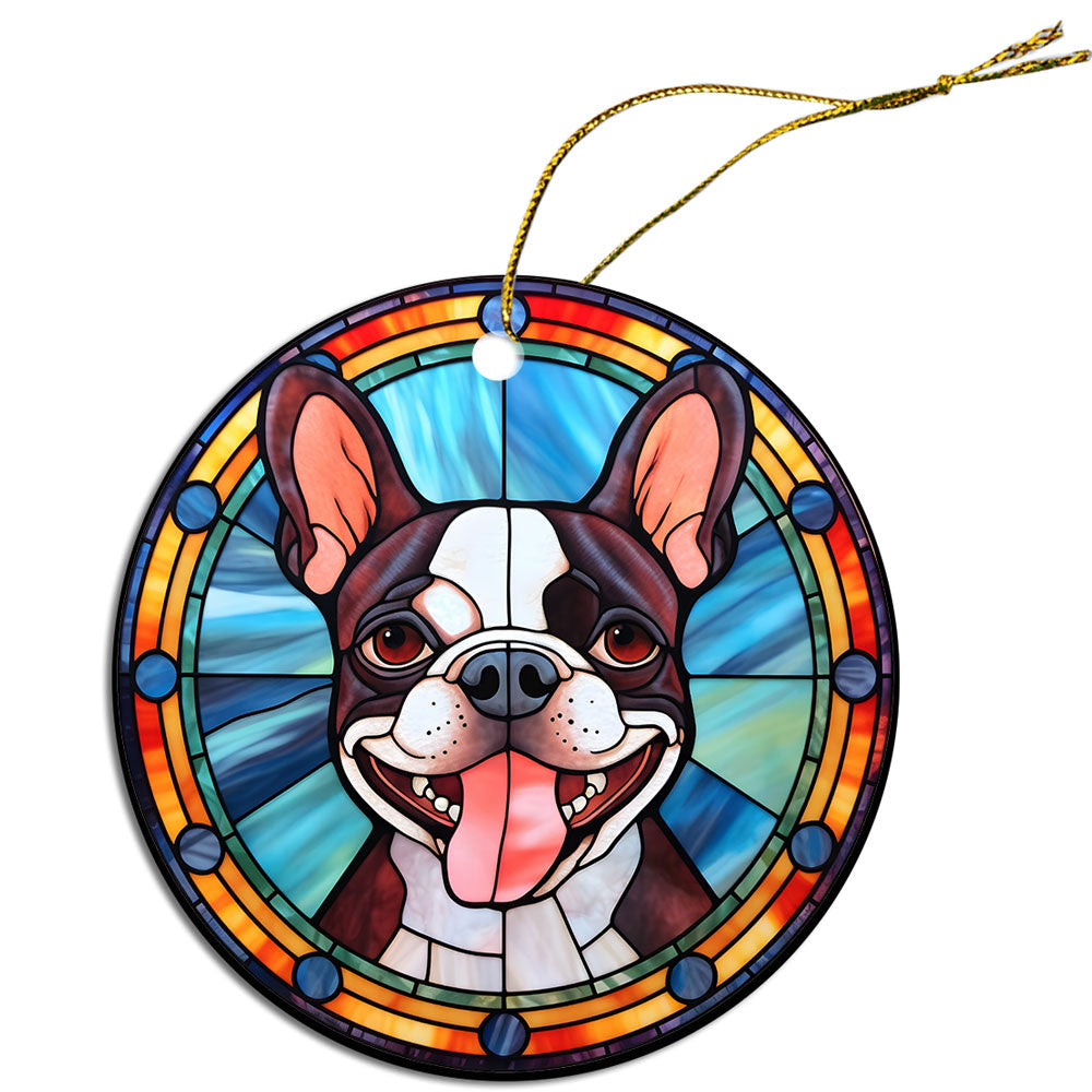 Stained glass style Christmas ornament featuring a Boston Terrier, elegantly designed with vibrant colors and a golden hanging string.