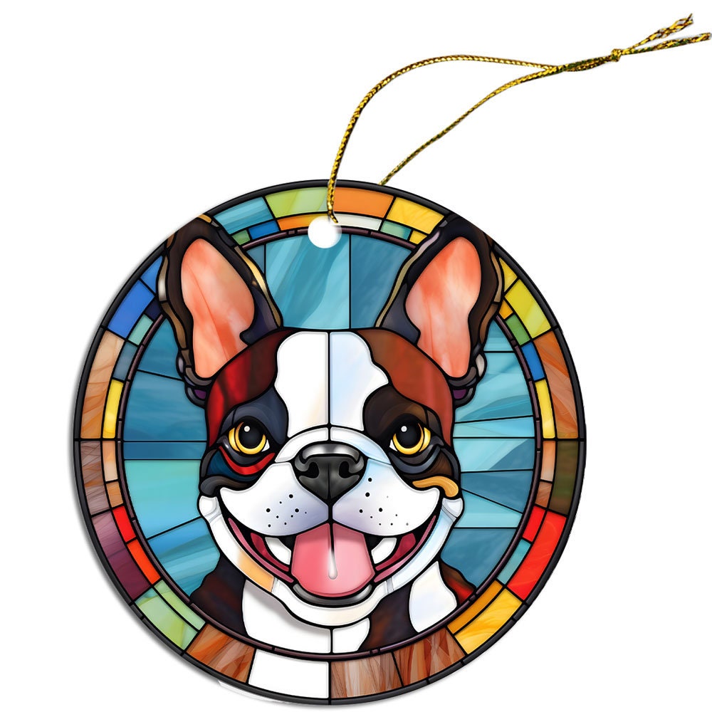 Stained glass style Christmas ornament featuring a Boston Terrier, elegantly designed with vibrant colors and a golden hanging string.