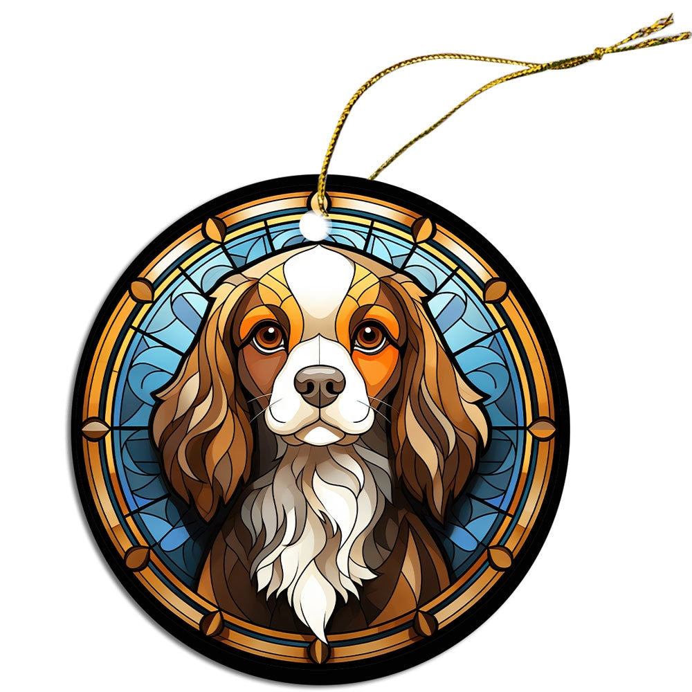 Cavalier King Charles Spaniel stained glass style Christmas ornament, featuring a round ceramic design with a golden string.
