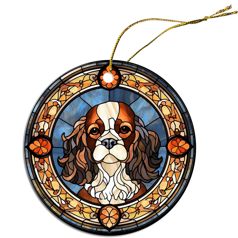 Cavalier King Charles Spaniel stained glass style Christmas ornament, featuring a round ceramic design with a golden string.