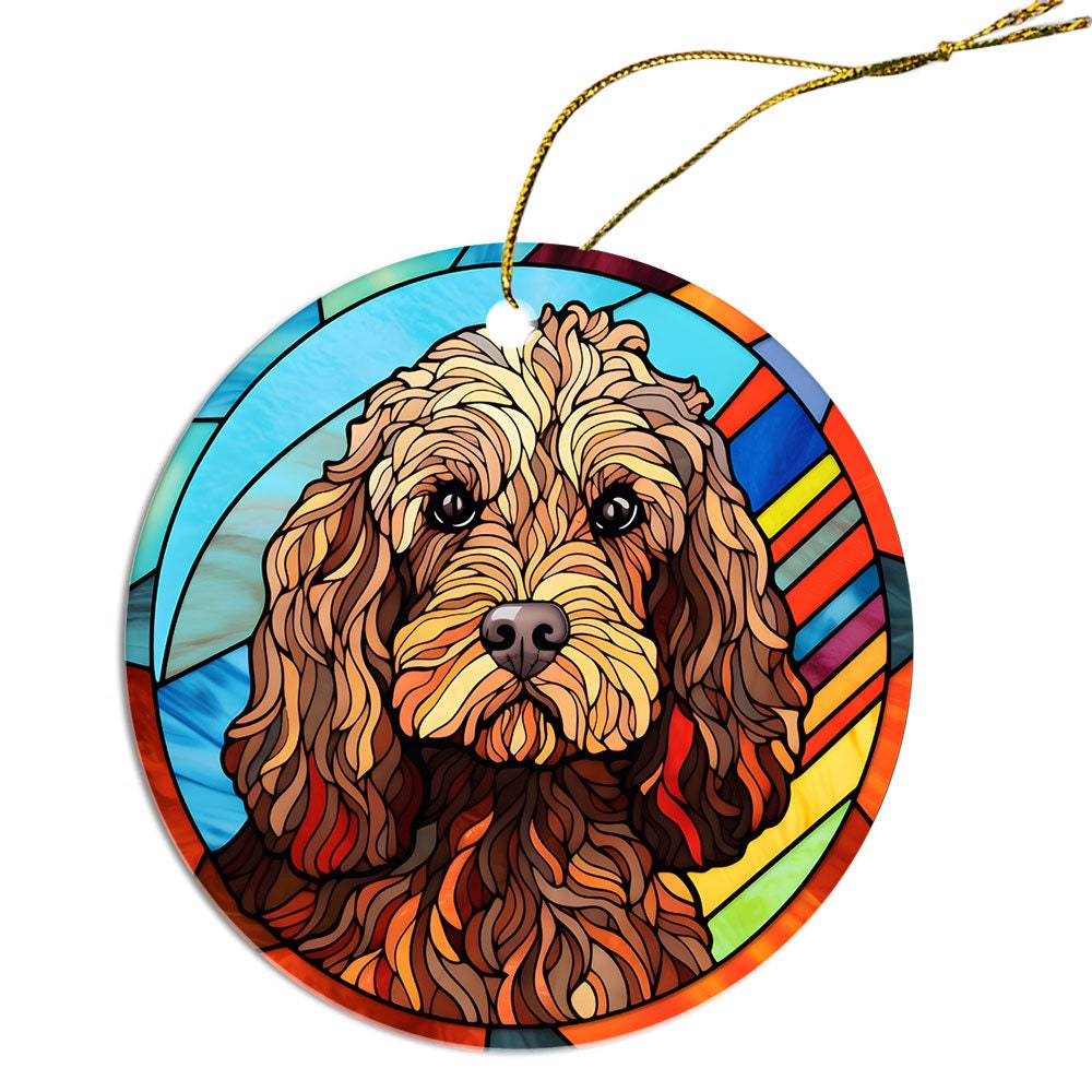 Stained glass style Christmas ornament featuring a Cockapoo breed, elegantly designed with vibrant colors and a golden string.