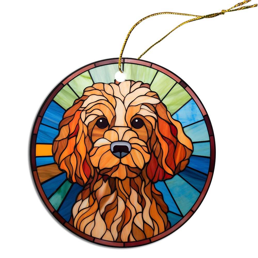 Stained glass style Christmas ornament featuring a Cockapoo breed, elegantly designed with vibrant colors and a golden string.