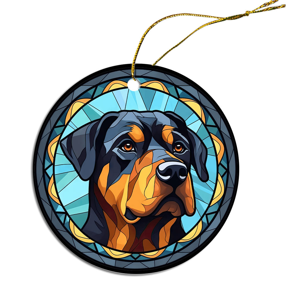 Stained glass style Christmas ornament featuring a Rottweiler breed design, elegantly hung with a golden string.