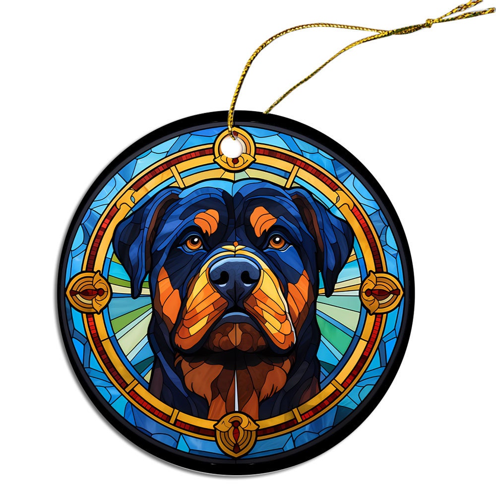 Stained glass style Christmas ornament featuring a Rottweiler breed design, elegantly hung with a golden string.