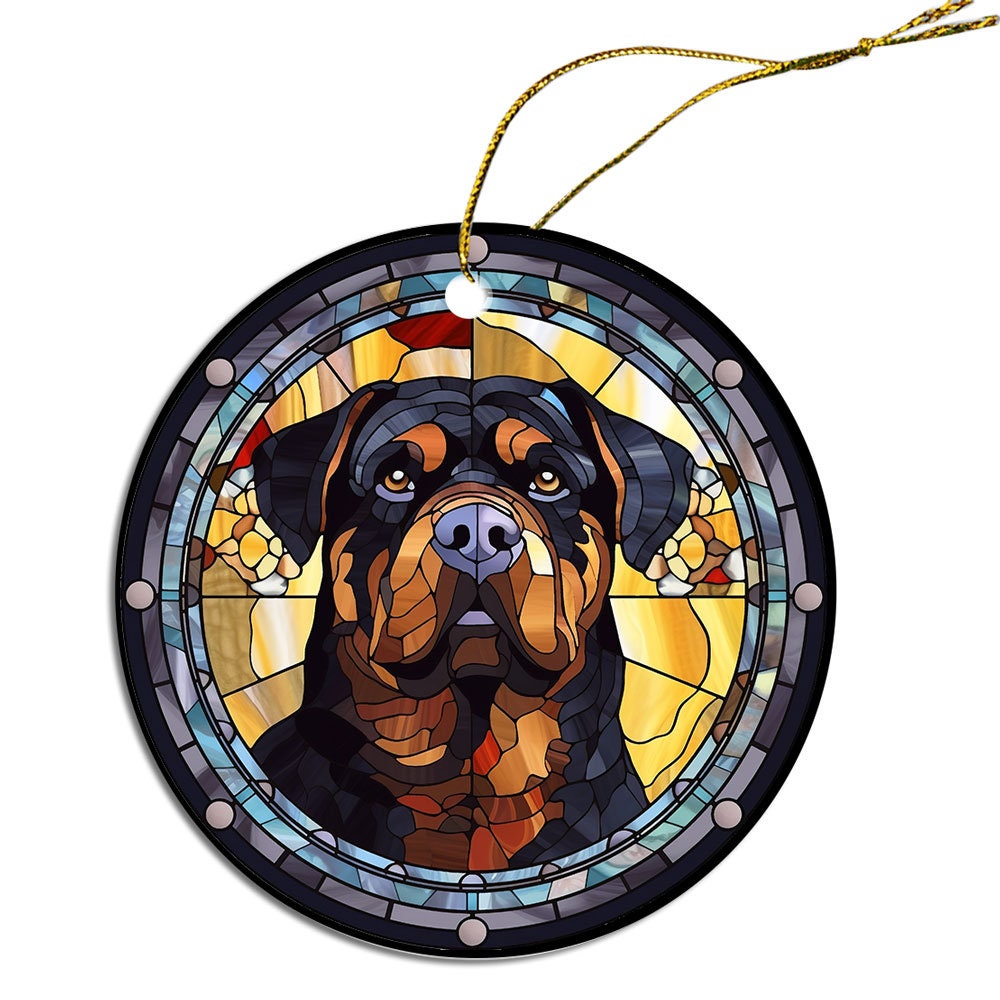 Stained glass style Christmas ornament featuring a Rottweiler breed design, elegantly hung with a golden string.