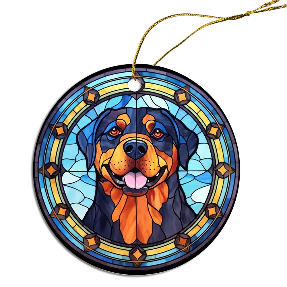 Stained glass style Christmas ornament featuring a Rottweiler breed design, elegantly hung with a golden string.