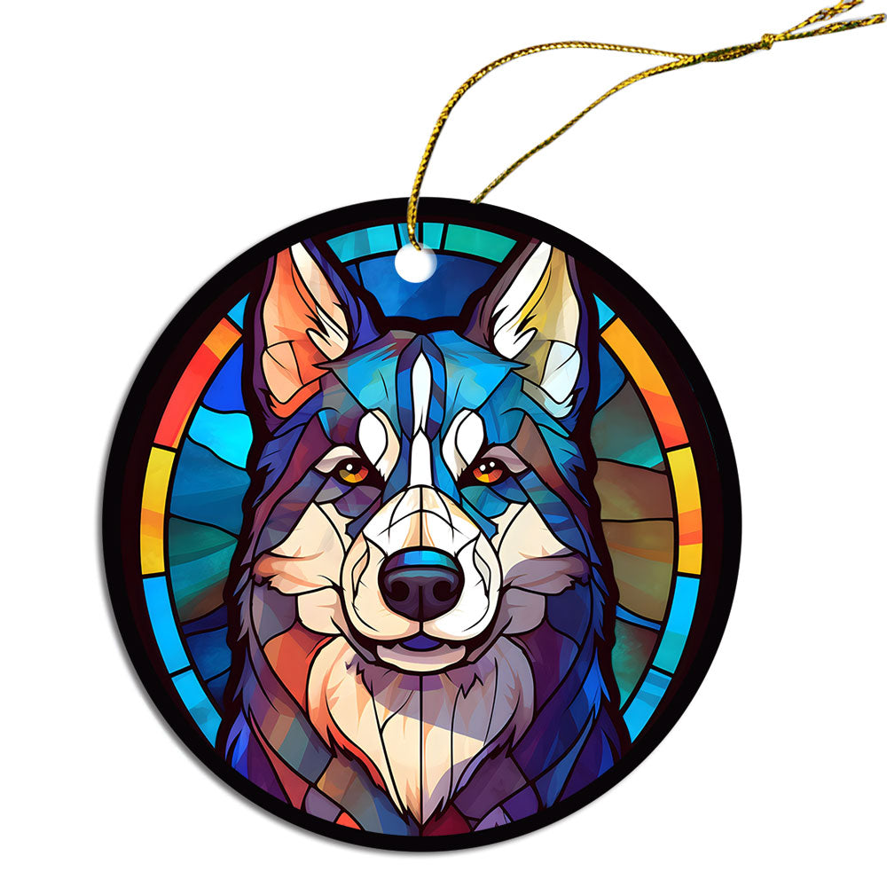 Siberian Husky stained glass style Christmas ornament, featuring a round ceramic design with vibrant colors and an elegant golden string.