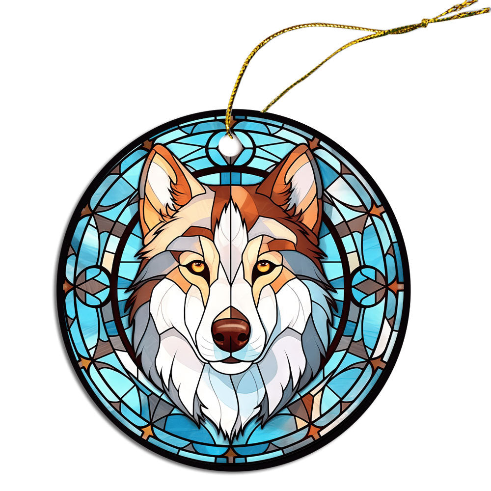 Siberian Husky stained glass style Christmas ornament, featuring a round ceramic design with vibrant colors and an elegant golden string.