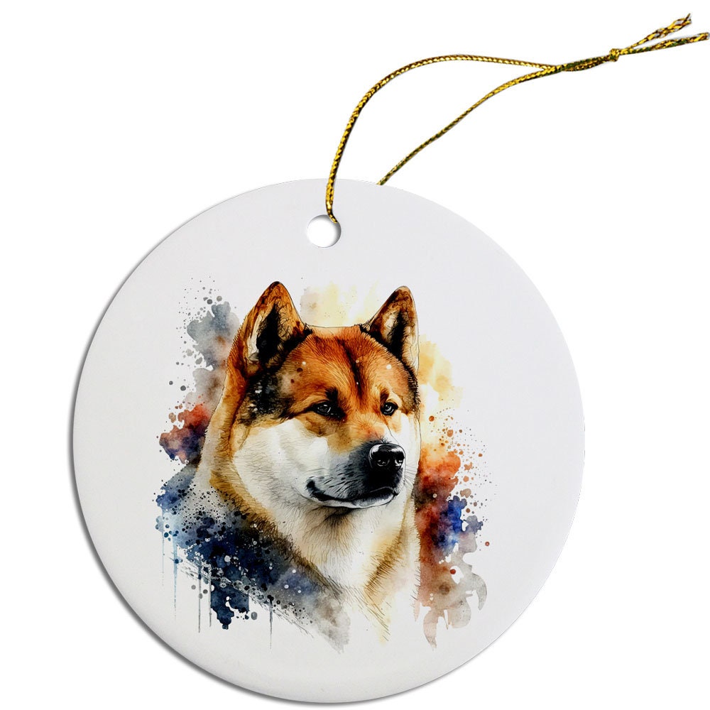 Ceramic round Christmas ornament featuring an Akita dog design with a golden string for hanging.