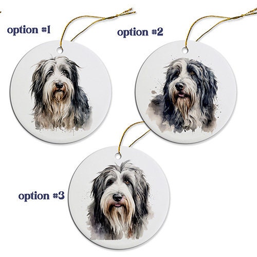 Ceramic round Christmas ornament featuring a Bearded Collie design with a golden string for hanging.