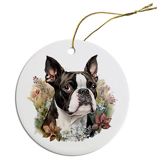 Ceramic round Christmas ornament featuring a Boston Terrier design with a golden string for hanging.