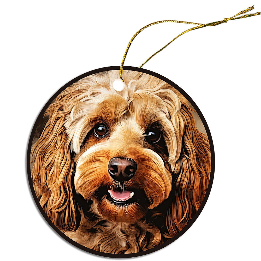 Ceramic round Christmas ornament featuring a Cockapoo design with a golden string for hanging.