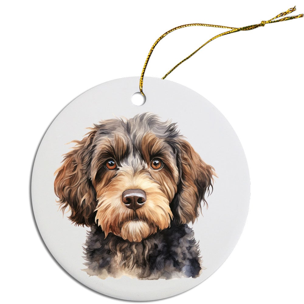 Ceramic round Christmas ornament featuring a Cockapoo design with a golden string for hanging.