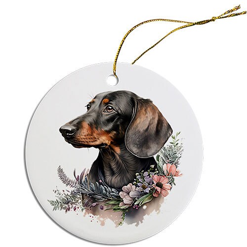 Ceramic round Christmas ornament featuring a Dachshund design with a golden string.