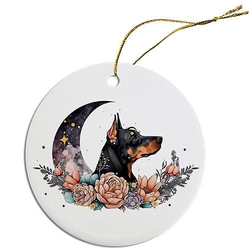 Ceramic round Christmas ornament featuring a Doberman design with a golden string for hanging.