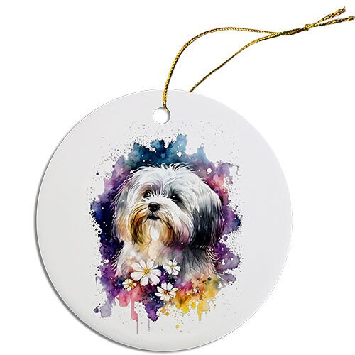 Ceramic round Christmas ornament featuring a Havanese dog design with a golden string for hanging.
