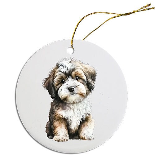 Ceramic round Christmas ornament featuring a Havanese dog design with a golden string for hanging.