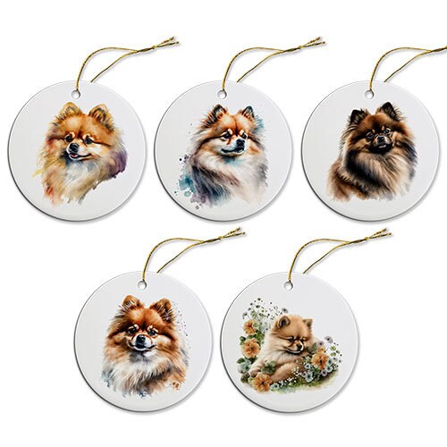 A round ceramic Christmas ornament featuring a cute Pomeranian design, with a golden string for hanging.