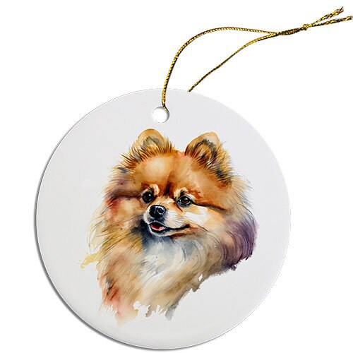 A round ceramic Christmas ornament featuring a cute Pomeranian design, with a golden string for hanging.