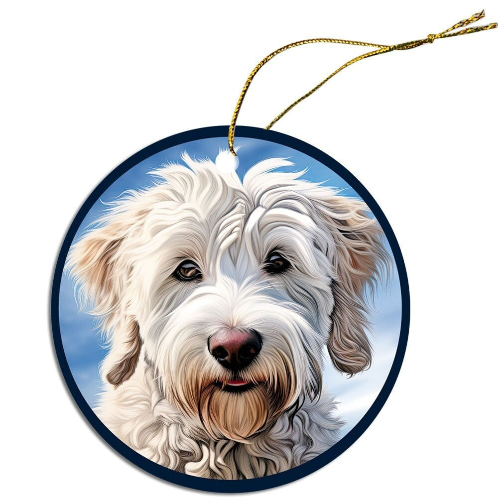 Ceramic round Christmas ornament featuring a Pyredoodle design, with a golden string for hanging.