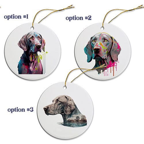 Ceramic round Christmas ornament featuring a Weimaraner dog, with a golden string for hanging.