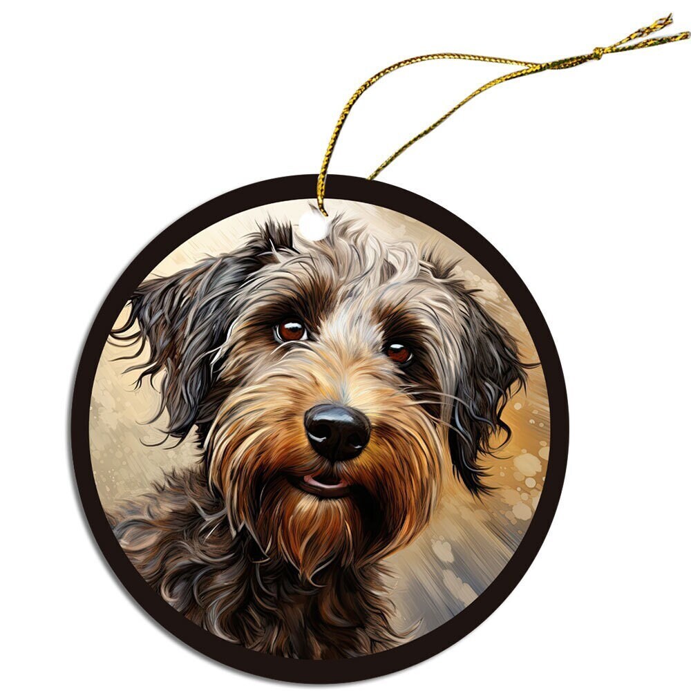 Ceramic round Christmas ornament featuring a Whoodle dog design with a golden string for hanging.