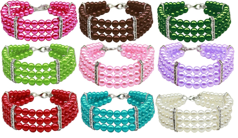 Three Row Pearl Necklace for dogs and cats featuring elegant pearls and rhinestone bars, showcasing a stylish design.