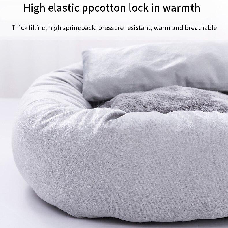 Cute round pet bed for dogs and cats, featuring a soft pillow and warm fabric, perfect for winter use.