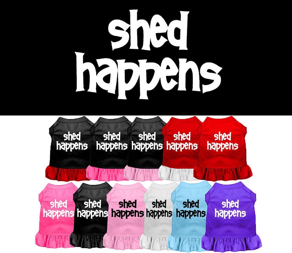 A cute dog wearing a 'Shed Happens' dress, showcasing its soft fabric and playful design.