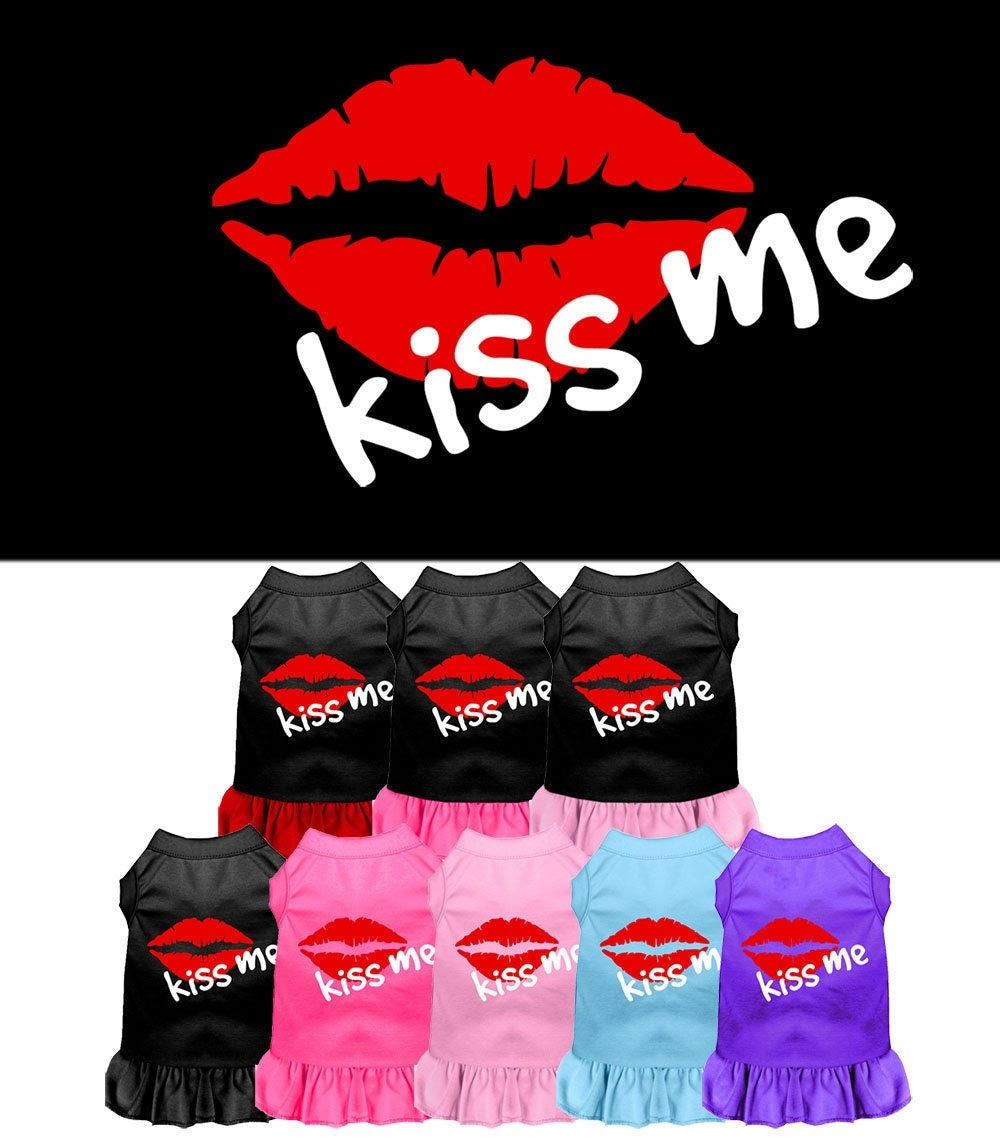 A cute dog wearing a 'Kiss Me' screen printed dress, showcasing a playful design and soft fabric.