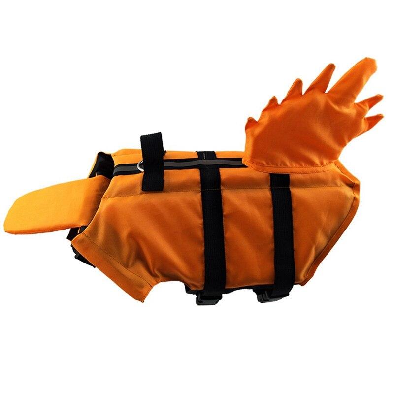 A vibrant shark-themed dog life vest designed for swimming, featuring adjustable straps and a sturdy handle for safety.