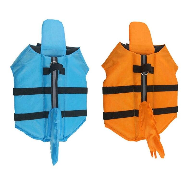 A vibrant shark-themed dog life vest designed for swimming, featuring adjustable straps and a sturdy handle for safety.