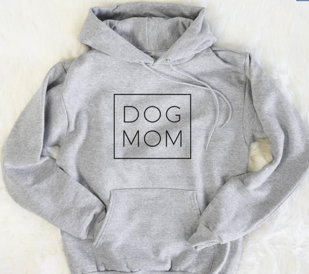 A cozy Dog Mom Hoodie in a stylish design, perfect for dog lovers, featuring a soft interior and unisex fit.