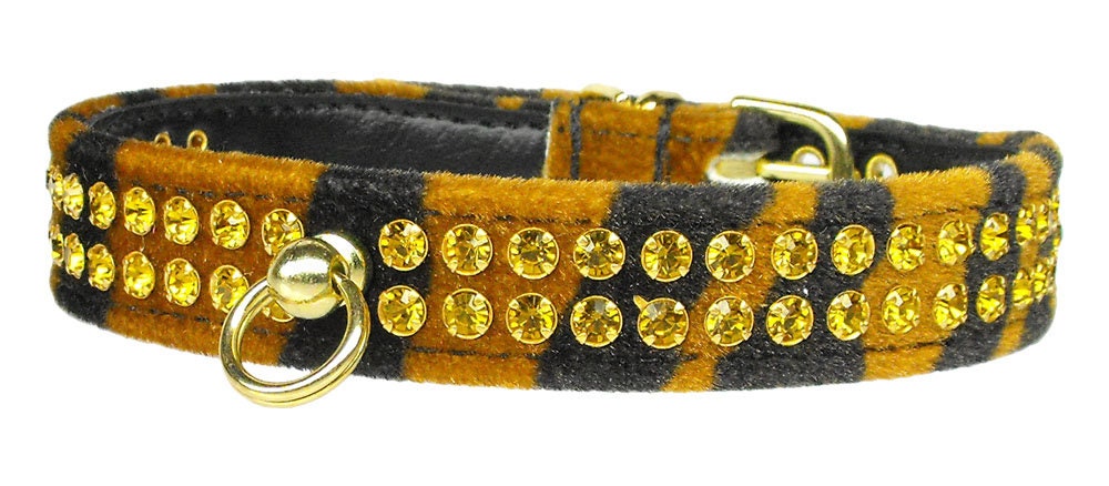 Animal Print Jungle King dog collar featuring rhinestones and a comfortable tapering design, perfect for stylish pets.