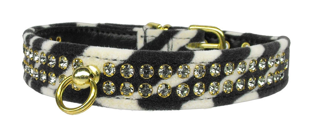 Animal Print Jungle King dog collar featuring rhinestones and a comfortable tapering design, perfect for stylish pets.