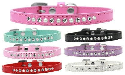 Stylish dog collar featuring pearls and clear crystals on faux leather, perfect for pets.