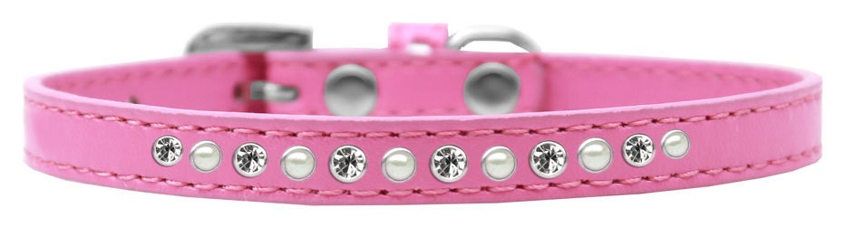 Stylish dog collar featuring pearls and clear crystals on faux leather, perfect for pets.