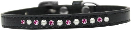 A stylish dog collar featuring pearl and pink crystals on a faux leather base, showcasing a crystal buckle.