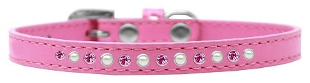 A stylish dog collar featuring pearl and pink crystals on a faux leather base, showcasing a crystal buckle.