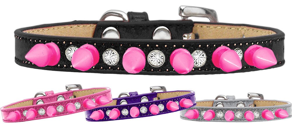 A stylish dog collar featuring clear crystals and bright pink spikes, designed for pets who love to stand out.