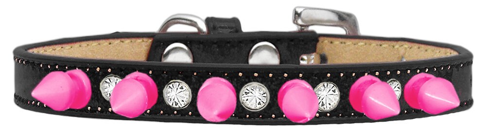 A stylish dog collar featuring clear crystals and bright pink spikes, designed for pets who love to stand out.