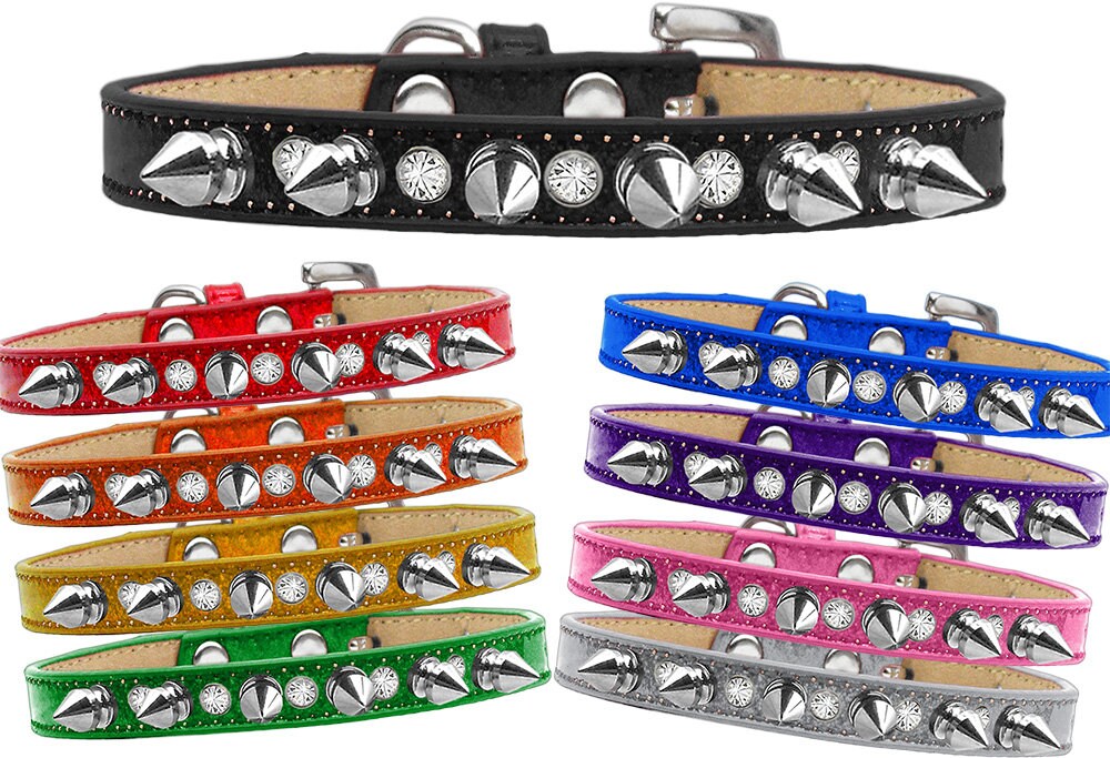 A stylish dog collar featuring glitter, clear crystals, and silver spikes, perfect for pets who love to stand out.
