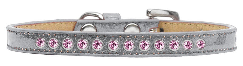 Elegant dog collar adorned with light pink crystals, designed for pets.