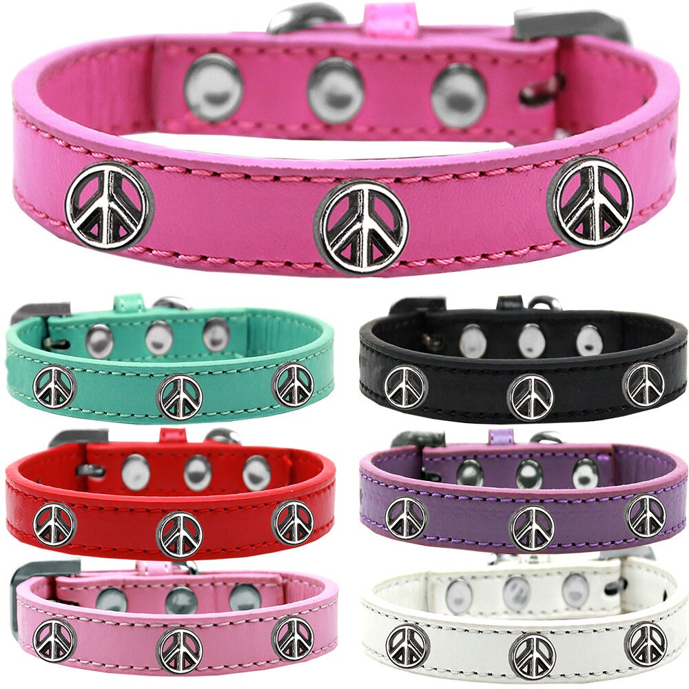 A stylish dog collar featuring a peace sign design, handmade with durable materials and metal widgets.
