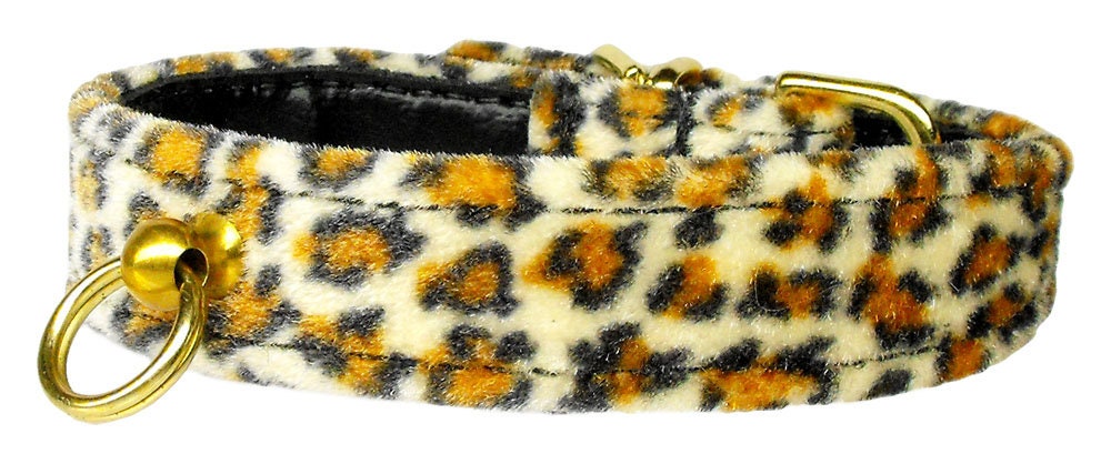 Stylish animal print dog collar featuring a tapered design for comfort, with a post for ID tag attachment.