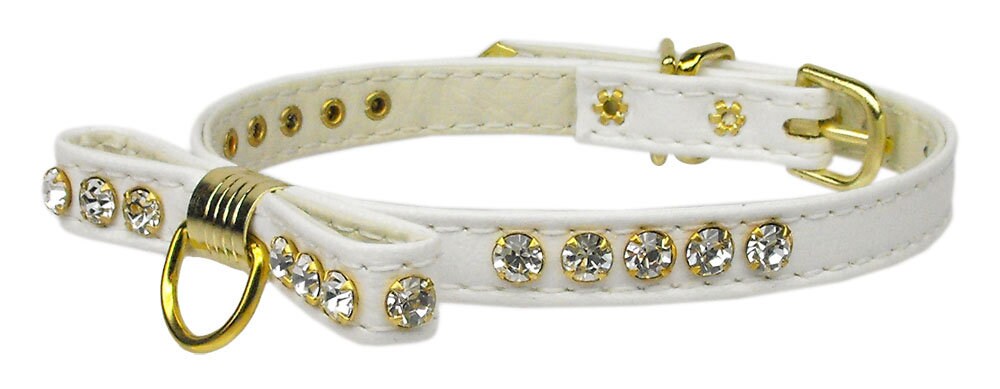 A stylish dog collar featuring a jeweled bow and clear crystals, perfect for pets.