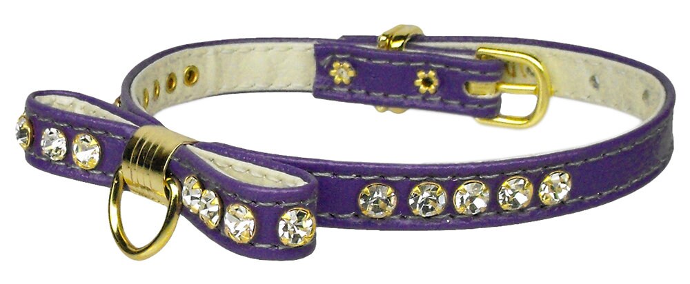 A stylish dog collar featuring a jeweled bow and clear crystals, perfect for pets.