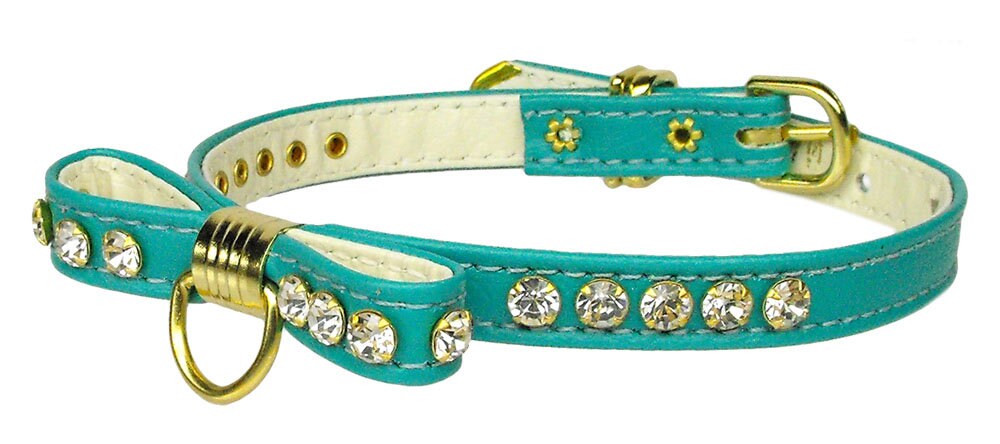 A stylish dog collar featuring a jeweled bow and clear crystals, perfect for pets.