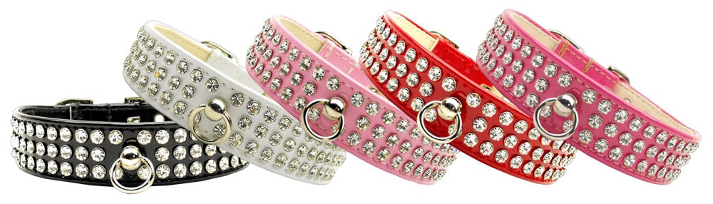 Stylish dog collar with three rows of sparkling clear crystals on a glistening patent faux leather background.